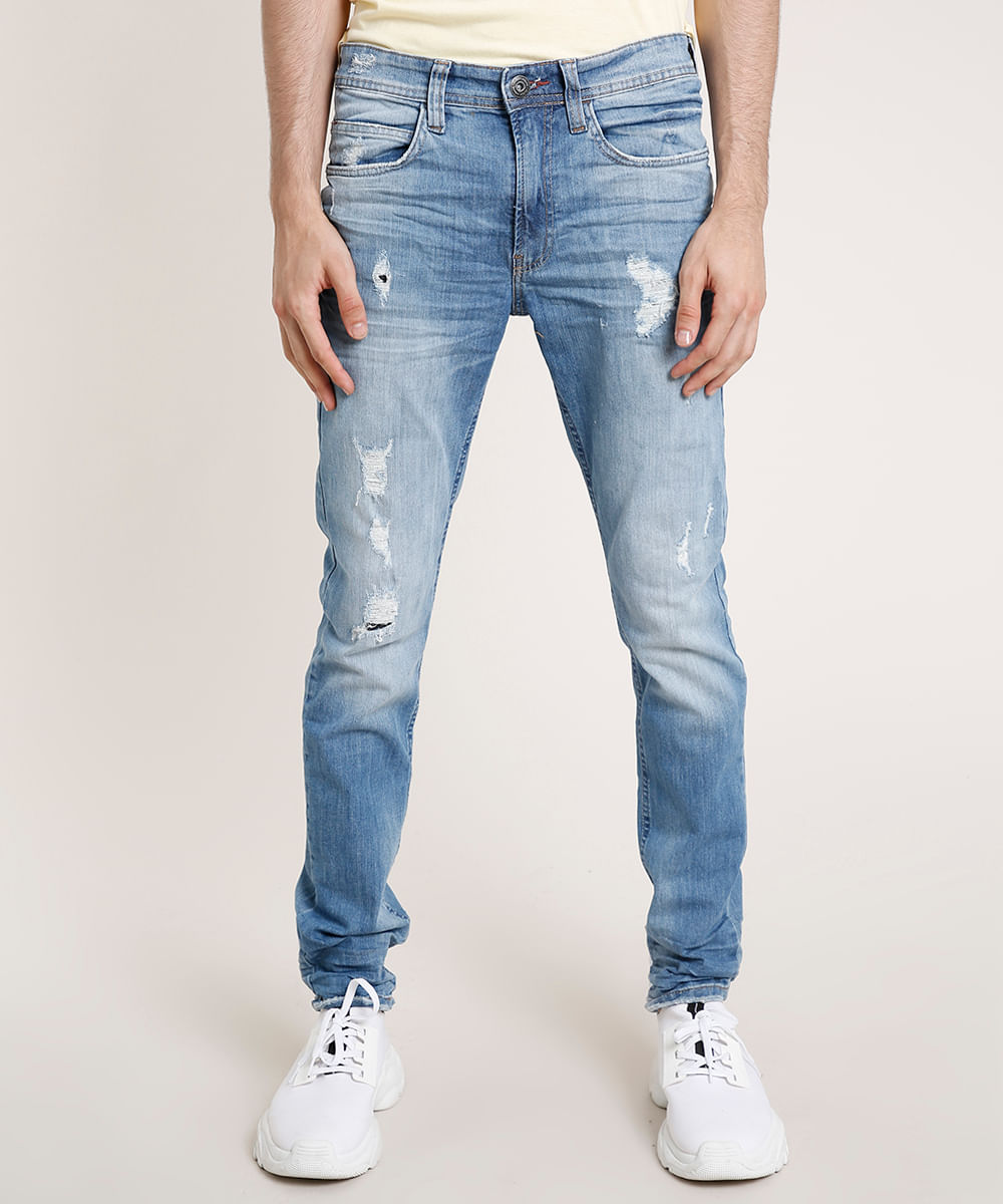 calça masculina com rasgos