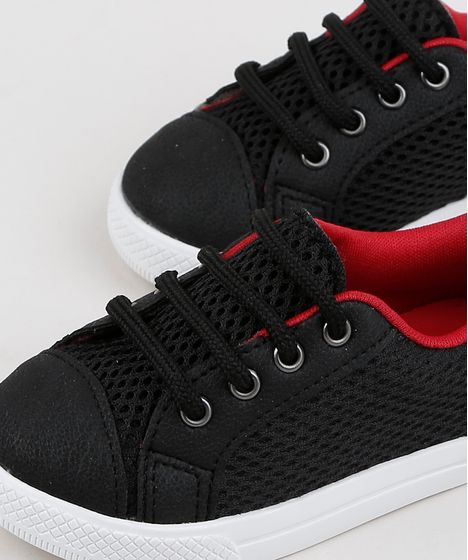 tenis preto criança