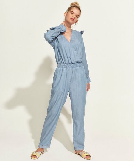 Macacao-Jeans-Feminino-com-Transpasse-e-Babado-Manga-Longa-Azul-Claro-9966620-Azul_Claro_1 Macacao-Jeans-Feminino-com-Transpasse-e-Babado-Manga-Longa-Azul-Claro-9966620-Azul_Claro_1