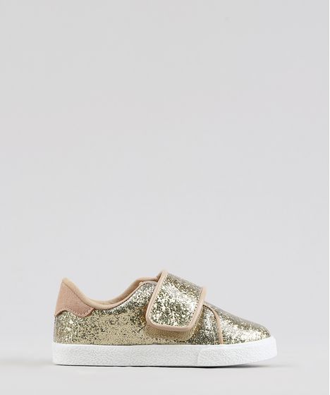 tenis dourado com glitter