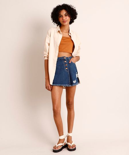 Short-Saia-de-Jeans-Cintura-Alta-Assimetrico-com-Puidos--Azul-Escuro-1003812-Azul_Escuro_1 Short-Saia-de-Jeans-Cintura-Alta-Assimetrico-com-Puidos--Azul-Escuro-1003812-Azul_Escuro_1