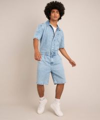 Macacão Jeans Marmorizado Curto Oversized Azul Claro frente