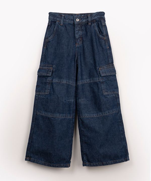 calça jeans ciclos reta cargo com recortes azul escuro 6