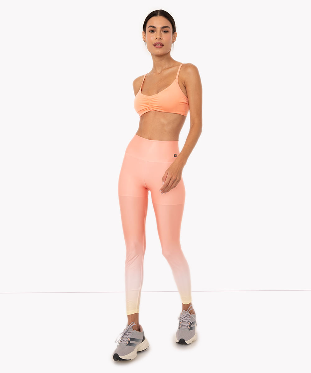 calça legging com bolso e proteção uv esportiva ace coral