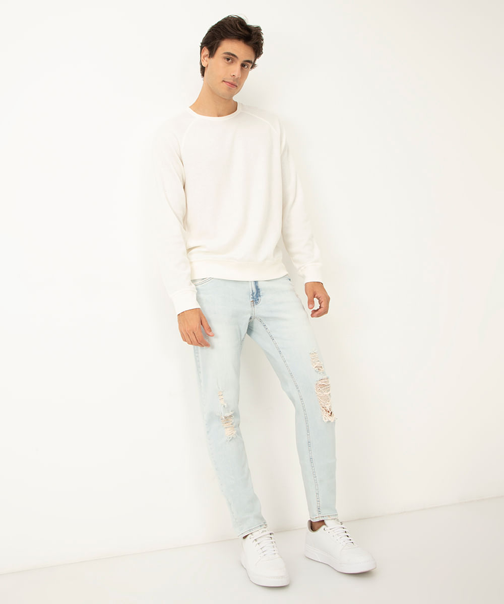 calça jeans slim destroyed com bolsos azul