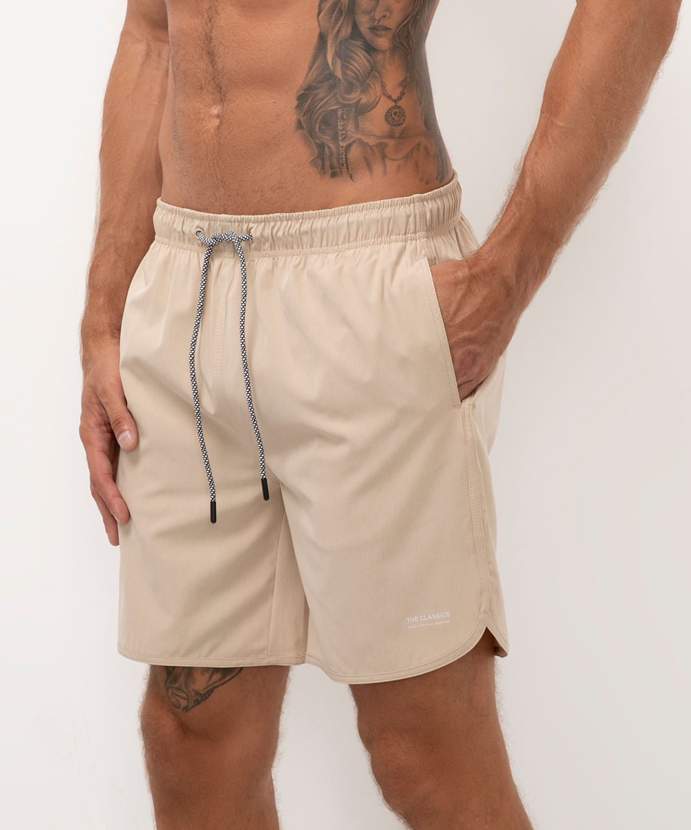 short praia com bolsos bege