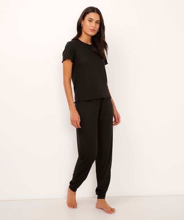calça de pijama jogger canelada preto G