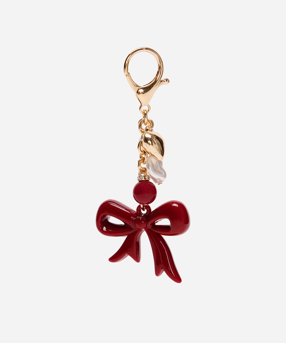 chaveiro bag charm com laço e pérolas vermelho