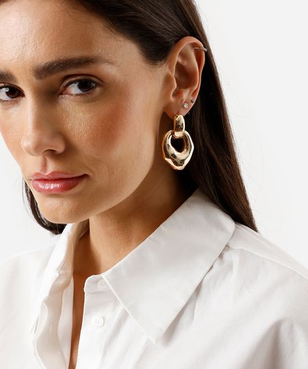 brinco banhado a ouro com pendulo orgânico dourado UNICO brinco banhado a ouro com pendulo orgânico dourado UNICO