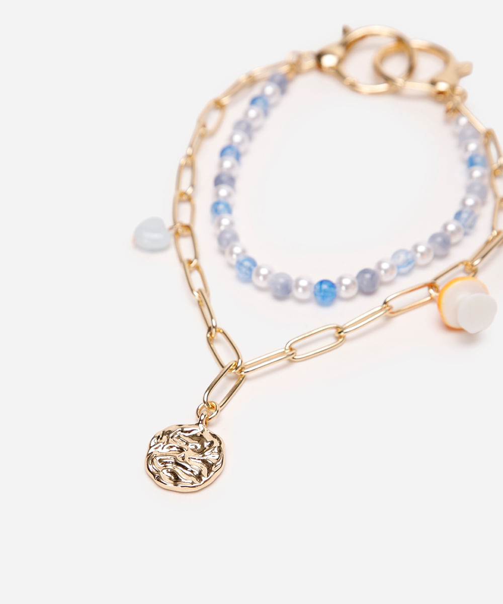 chaveiro bag charm com pérolas e cogumelo dourado