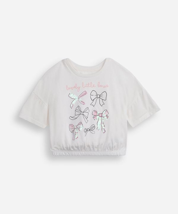 camiseta infantil de algodão com laços e paetês off white 12