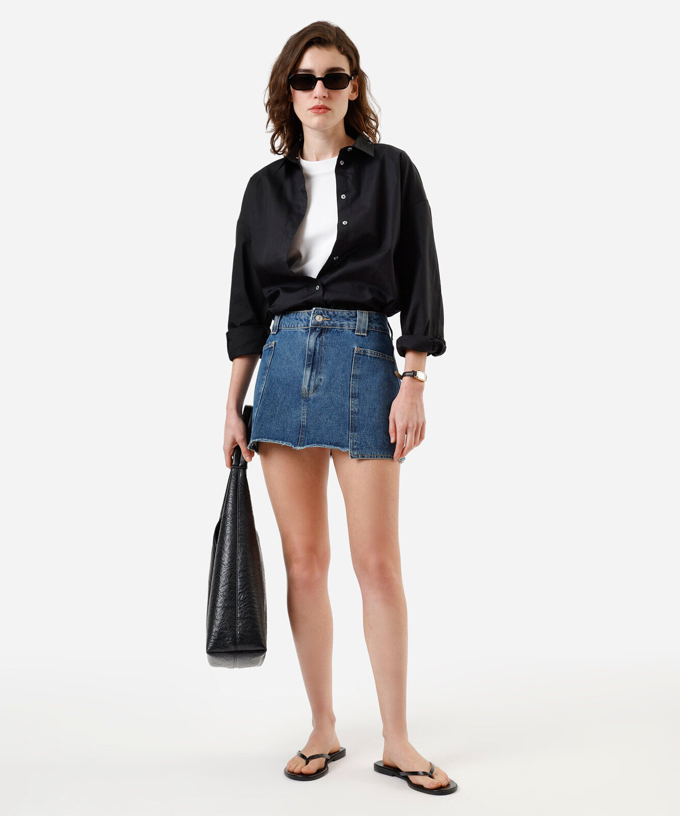 minissaia feminina jeans com barra a fio cintura baixa azul
