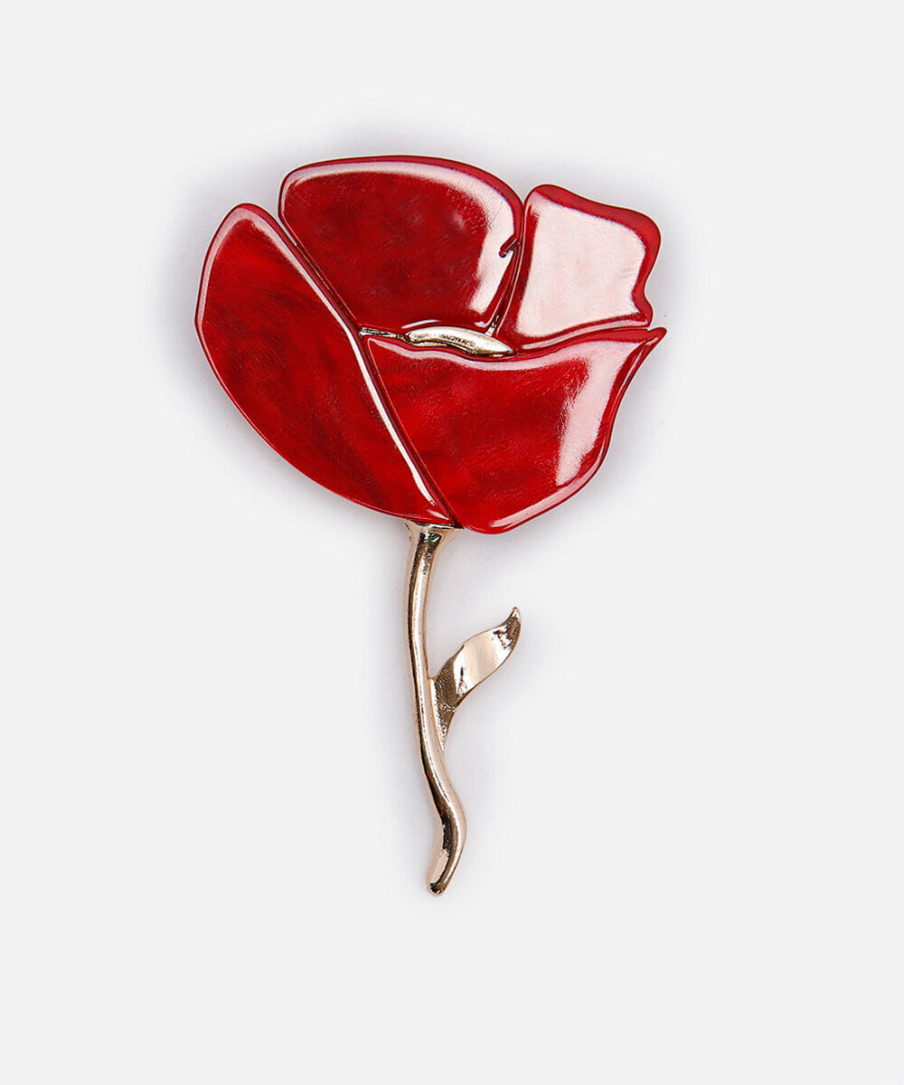 broche floral dourado