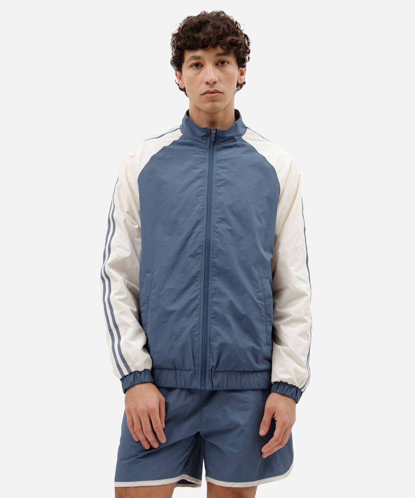 jaqueta corta vento masculina de poliamida esportiva bicolor azul